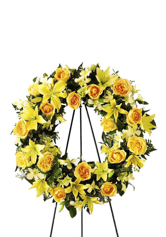 sympathy flowers yellow standing wreath